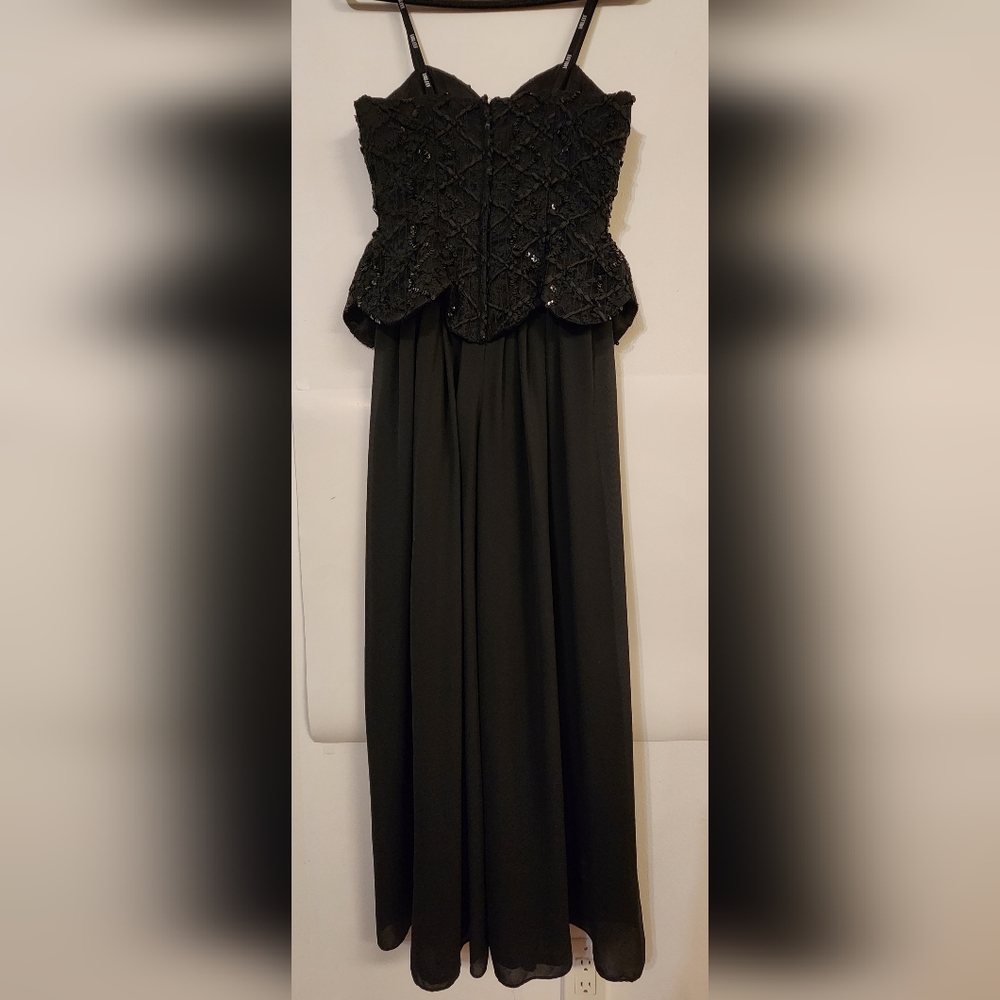 Black wild leg strapless jumpsuit, Size: 6 US
